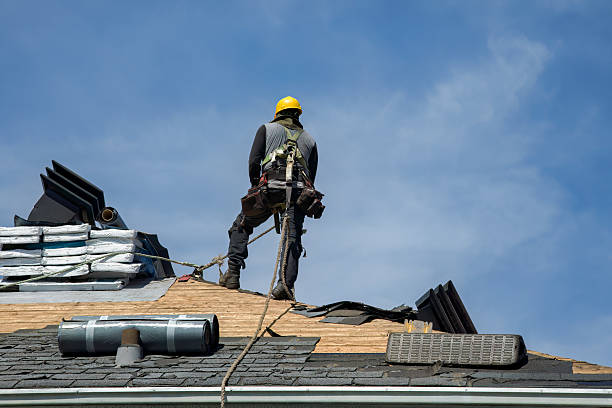 Professional Roofing technician working in Winthrop, IA
